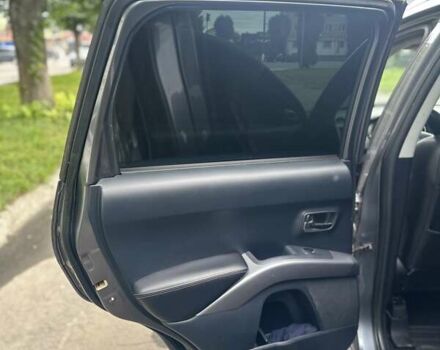 Серый Мицубиси Аутлендер, объемом двигателя 2 л и пробегом 250 тыс. км за 9300 $, фото 9 на Automoto.ua