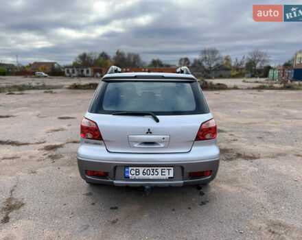 Серый Мицубиси Аутлендер, объемом двигателя 2.4 л и пробегом 264 тыс. км за 6300 $, фото 5 на Automoto.ua