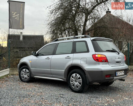 Серый Мицубиси Аутлендер, объемом двигателя 2.38 л и пробегом 204 тыс. км за 6990 $, фото 31 на Automoto.ua