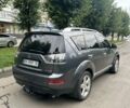 Серый Мицубиси Аутлендер, объемом двигателя 2 л и пробегом 250 тыс. км за 9300 $, фото 5 на Automoto.ua