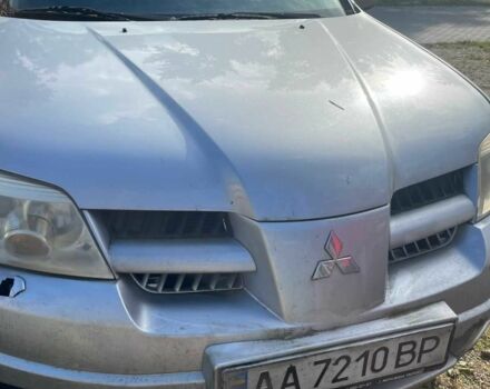 Серый Мицубиси Аутлендер, объемом двигателя 2.4 л и пробегом 127 тыс. км за 4400 $, фото 1 на Automoto.ua