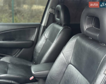 Серый Мицубиси Аутлендер, объемом двигателя 2.38 л и пробегом 204 тыс. км за 6990 $, фото 8 на Automoto.ua