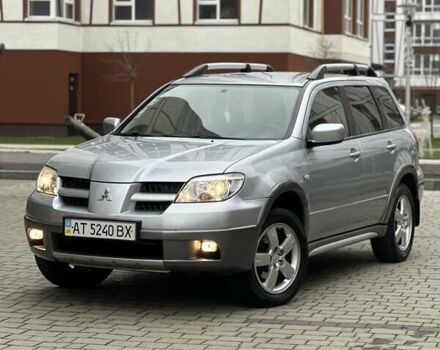 Сірий Міцубісі Аутлендер, об'ємом двигуна 2.4 л та пробігом 98 тис. км за 7199 $, фото 6 на Automoto.ua