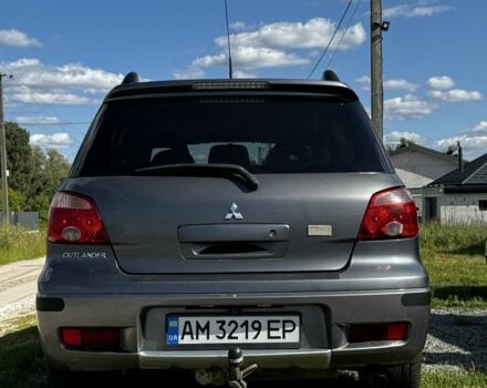 Серый Мицубиси Аутлендер, объемом двигателя 2 л и пробегом 209 тыс. км за 5999 $, фото 7 на Automoto.ua