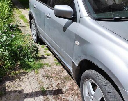 Серый Мицубиси Аутлендер, объемом двигателя 2.38 л и пробегом 161 тыс. км за 6400 $, фото 3 на Automoto.ua