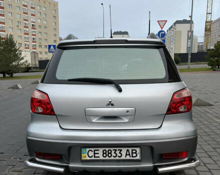 Серый Мицубиси Аутлендер, объемом двигателя 2.38 л и пробегом 180 тыс. км за 6000 $, фото 11 на Automoto.ua