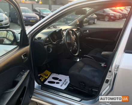 Серый Мицубиси Аутлендер, объемом двигателя 2.4 л и пробегом 231 тыс. км за 8100 $, фото 8 на Automoto.ua