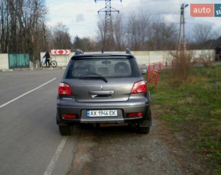 Серый Мицубиси Аутлендер, объемом двигателя 2.4 л и пробегом 235 тыс. км за 6500 $, фото 7 на Automoto.ua