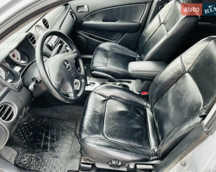 Серый Мицубиси Аутлендер, объемом двигателя 2.4 л и пробегом 264 тыс. км за 6300 $, фото 16 на Automoto.ua