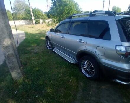 Сірий Міцубісі Аутлендер, об'ємом двигуна 2.38 л та пробігом 226 тис. км за 10000 $, фото 4 на Automoto.ua