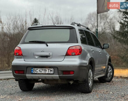 Серый Мицубиси Аутлендер, объемом двигателя 2.38 л и пробегом 204 тыс. км за 6990 $, фото 29 на Automoto.ua