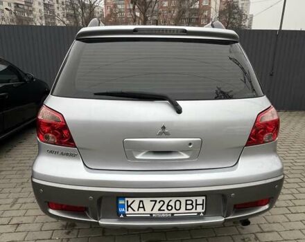 Серый Мицубиси Аутлендер, объемом двигателя 2.4 л и пробегом 179 тыс. км за 7000 $, фото 1 на Automoto.ua