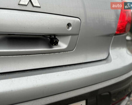 Серый Мицубиси Аутлендер, объемом двигателя 2.38 л и пробегом 204 тыс. км за 6990 $, фото 13 на Automoto.ua