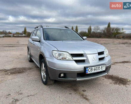 Серый Мицубиси Аутлендер, объемом двигателя 2.4 л и пробегом 264 тыс. км за 6300 $, фото 9 на Automoto.ua