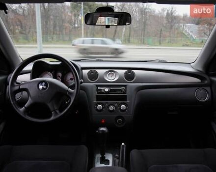 Серый Мицубиси Аутлендер, объемом двигателя 2.4 л и пробегом 171 тыс. км за 8200 $, фото 11 на Automoto.ua