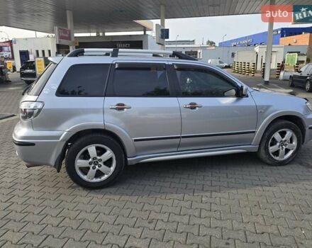 Серый Мицубиси Аутлендер, объемом двигателя 2.4 л и пробегом 243 тыс. км за 6999 $, фото 20 на Automoto.ua