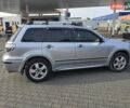 Серый Мицубиси Аутлендер, объемом двигателя 2.4 л и пробегом 243 тыс. км за 6999 $, фото 20 на Automoto.ua