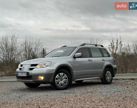 Серый Мицубиси Аутлендер, объемом двигателя 2.38 л и пробегом 204 тыс. км за 6990 $, фото 3 на Automoto.ua