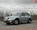 Серый Мицубиси Аутлендер, объемом двигателя 2.38 л и пробегом 204 тыс. км за 6990 $, фото 3 на Automoto.ua