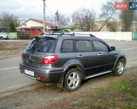 Серый Мицубиси Аутлендер, объемом двигателя 2.4 л и пробегом 235 тыс. км за 6500 $, фото 9 на Automoto.ua