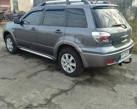 Серый Мицубиси Аутлендер, объемом двигателя 2 л и пробегом 154 тыс. км за 6500 $, фото 4 на Automoto.ua