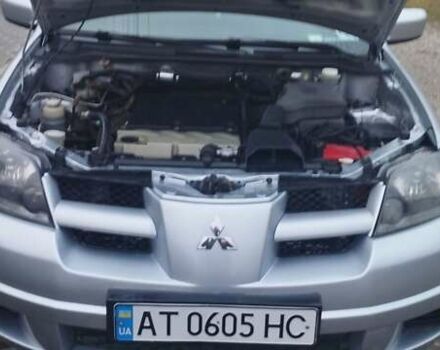 Серый Мицубиси Аутлендер, объемом двигателя 2.4 л и пробегом 261 тыс. км за 5700 $, фото 6 на Automoto.ua