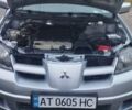 Серый Мицубиси Аутлендер, объемом двигателя 2.4 л и пробегом 261 тыс. км за 5700 $, фото 6 на Automoto.ua