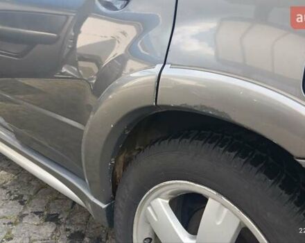 Серый Мицубиси Аутлендер, объемом двигателя 2.38 л и пробегом 600 тыс. км за 5700 $, фото 2 на Automoto.ua