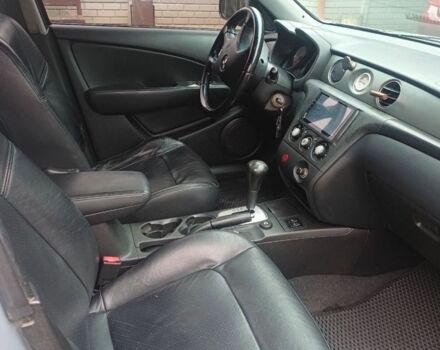 Серый Мицубиси Аутлендер, объемом двигателя 2.4 л и пробегом 240 тыс. км за 7300 $, фото 4 на Automoto.ua