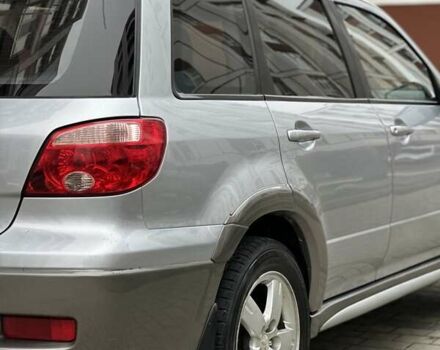 Сірий Міцубісі Аутлендер, об'ємом двигуна 2.4 л та пробігом 98 тис. км за 7199 $, фото 47 на Automoto.ua