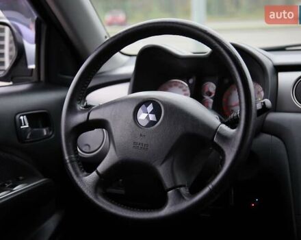 Серый Мицубиси Аутлендер, объемом двигателя 2.4 л и пробегом 171 тыс. км за 8200 $, фото 13 на Automoto.ua