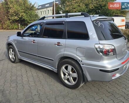 Серый Мицубиси Аутлендер, объемом двигателя 2.4 л и пробегом 243 тыс. км за 6999 $, фото 15 на Automoto.ua