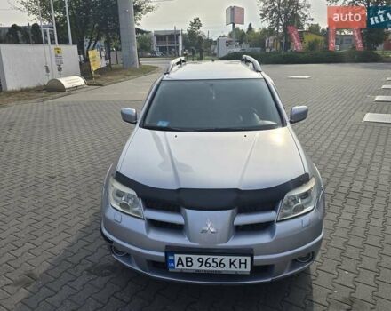Серый Мицубиси Аутлендер, объемом двигателя 2.4 л и пробегом 243 тыс. км за 6999 $, фото 23 на Automoto.ua