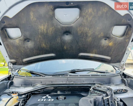 Серый Мицубиси Аутлендер, объемом двигателя 2 л и пробегом 179 тыс. км за 9500 $, фото 17 на Automoto.ua