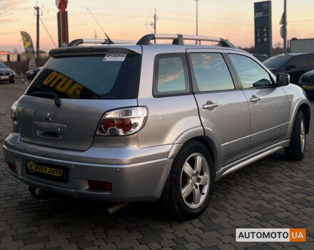 Серый Мицубиси Аутлендер, объемом двигателя 2.4 л и пробегом 231 тыс. км за 8100 $, фото 6 на Automoto.ua