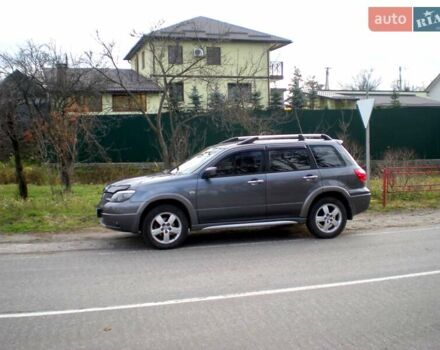 Серый Мицубиси Аутлендер, объемом двигателя 2.4 л и пробегом 235 тыс. км за 6500 $, фото 16 на Automoto.ua