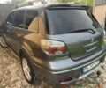 Сірий Міцубісі Аутлендер, об'ємом двигуна 2 л та пробігом 243 тис. км за 5450 $, фото 11 на Automoto.ua