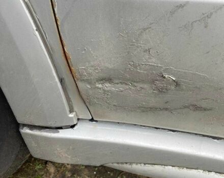 Серый Мицубиси Аутлендер, объемом двигателя 2.4 л и пробегом 127 тыс. км за 4400 $, фото 12 на Automoto.ua