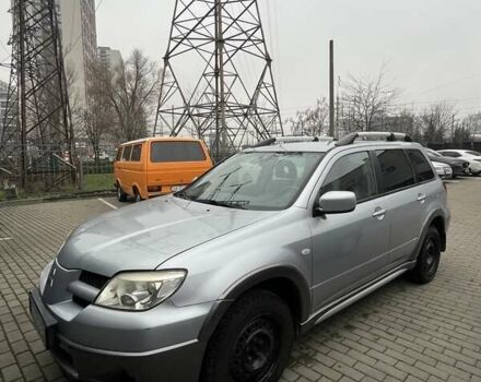 Серый Мицубиси Аутлендер, объемом двигателя 2.4 л и пробегом 179 тыс. км за 7000 $, фото 2 на Automoto.ua