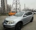 Серый Мицубиси Аутлендер, объемом двигателя 2.4 л и пробегом 179 тыс. км за 7000 $, фото 2 на Automoto.ua