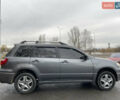 Серый Мицубиси Аутлендер, объемом двигателя 2 л и пробегом 275 тыс. км за 6950 $, фото 5 на Automoto.ua
