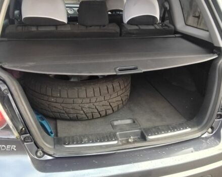 Серый Мицубиси Аутлендер, объемом двигателя 2 л и пробегом 154 тыс. км за 6500 $, фото 11 на Automoto.ua