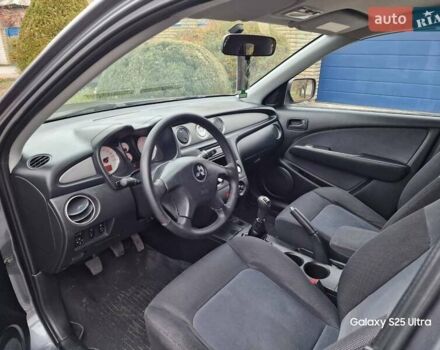 Серый Мицубиси Аутлендер, объемом двигателя 2 л и пробегом 240 тыс. км за 6300 $, фото 12 на Automoto.ua