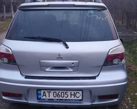 Серый Мицубиси Аутлендер, объемом двигателя 2.4 л и пробегом 261 тыс. км за 5700 $, фото 27 на Automoto.ua