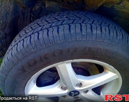 Мицубиси Аутлендер 2006 в Золотоноше на Automoto.ua Серый Мицубиси Аутлендер, объемом двигателя 2 л и пробегом 250 тыс. км за 5500 $, фото 5 на Automoto.ua