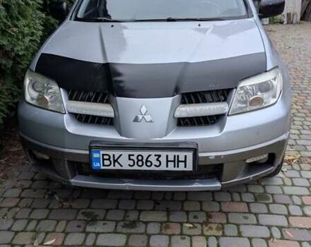 Серый Мицубиси Аутлендер, объемом двигателя 2 л и пробегом 226 тыс. км за 5500 $, фото 7 на Automoto.ua