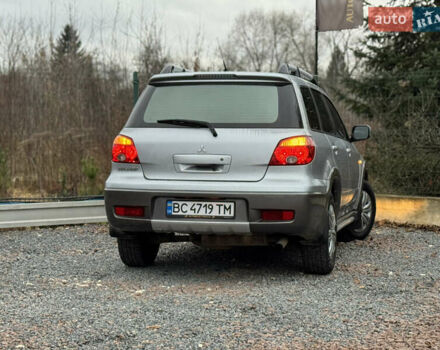Серый Мицубиси Аутлендер, объемом двигателя 2.38 л и пробегом 204 тыс. км за 6990 $, фото 34 на Automoto.ua