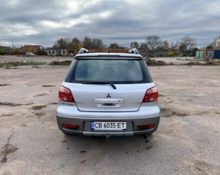 Серый Мицубиси Аутлендер, объемом двигателя 2.4 л и пробегом 264 тыс. км за 6300 $, фото 5 на Automoto.ua