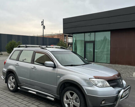 Серый Мицубиси Аутлендер, объемом двигателя 2.38 л и пробегом 180 тыс. км за 6000 $, фото 8 на Automoto.ua