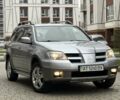 Сірий Міцубісі Аутлендер, об'ємом двигуна 2.4 л та пробігом 98 тис. км за 7199 $, фото 22 на Automoto.ua